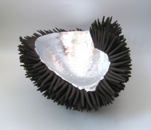 Claire Palastanga 'Strength' black earthenware with silver leaf