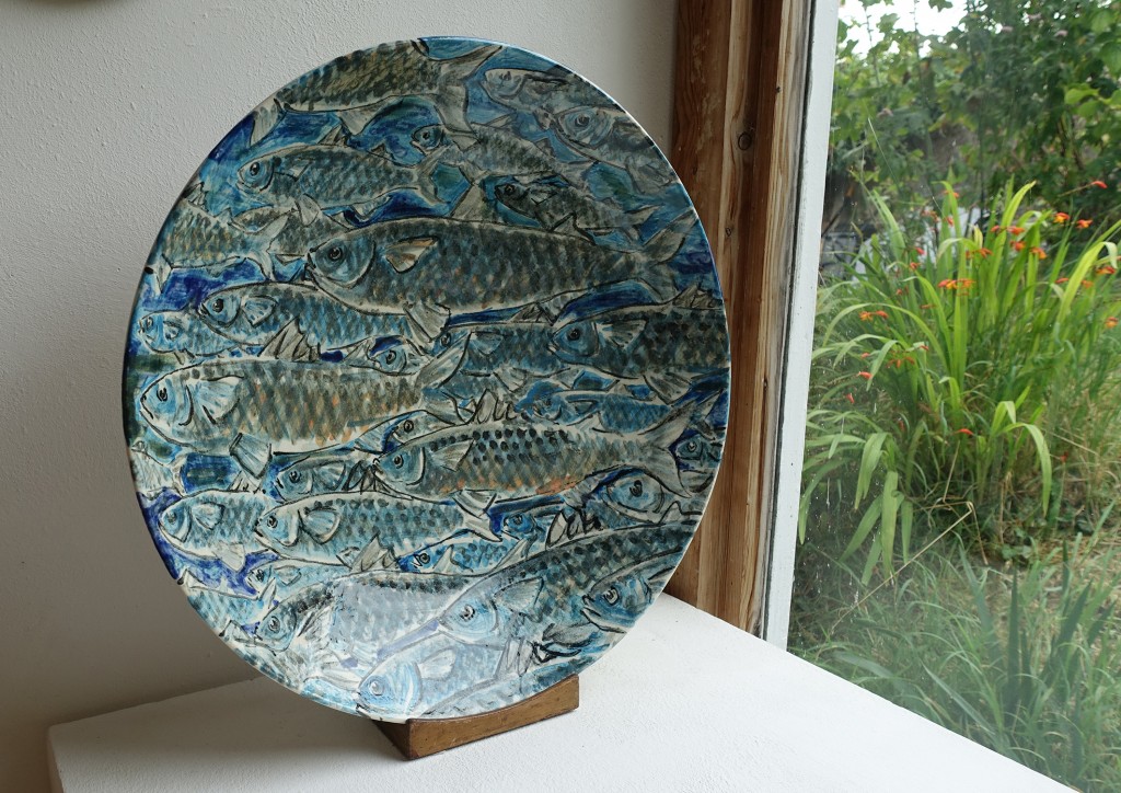 A stoneware charger titled ‘Mullet’ by Josse Davis