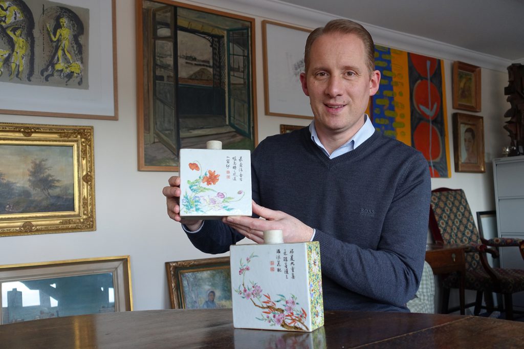 Toovey’s Asian Art Specialist, Tom Rowsell, with the £132,000 pair of Qianlong period tea caddies