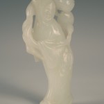 1113 A Chinese white jade carving of a maiden