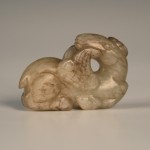 1117 A Chinese archaic jade carving of a deer biting a Lingzhi fungus