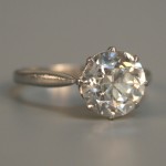 A platinum and diamond single stone ring