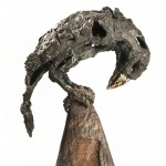 Olivia Ferrier: Detail of 'Alchemy', bronze with gold beak on a reclaimed Sussex sea groin, produced in an edition of 9
