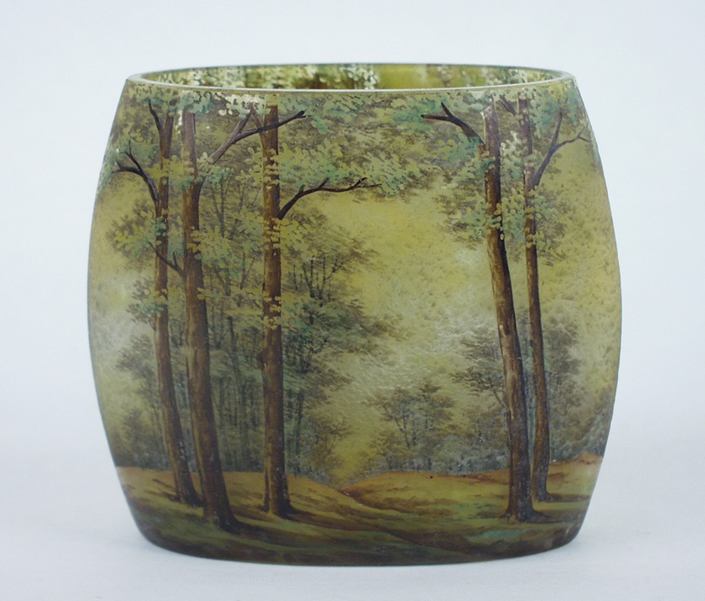 A Daum Nancy enamelled cameo glass summer landscape vase, of oval form