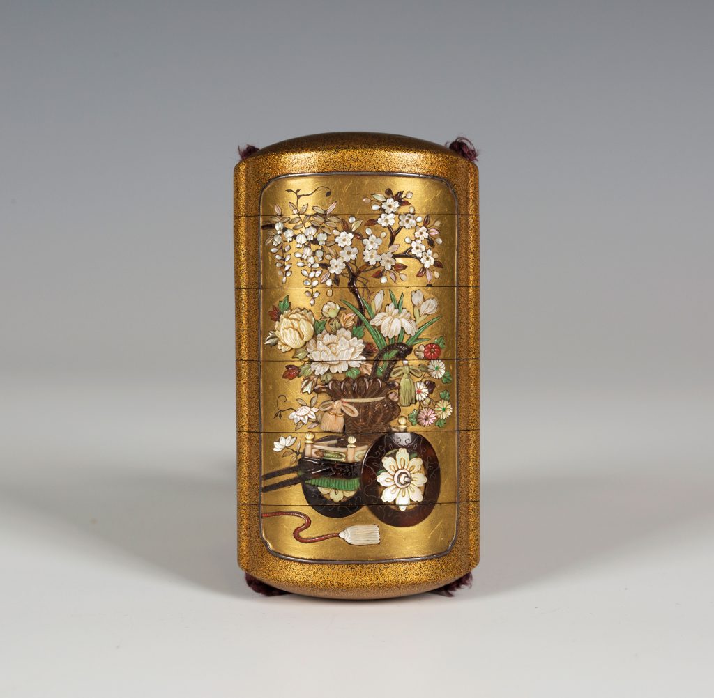 A Japanese lacquer and Shibayama inlaid five case inro, Meiji period (1868-1912), sold at Toovey’s for £3200